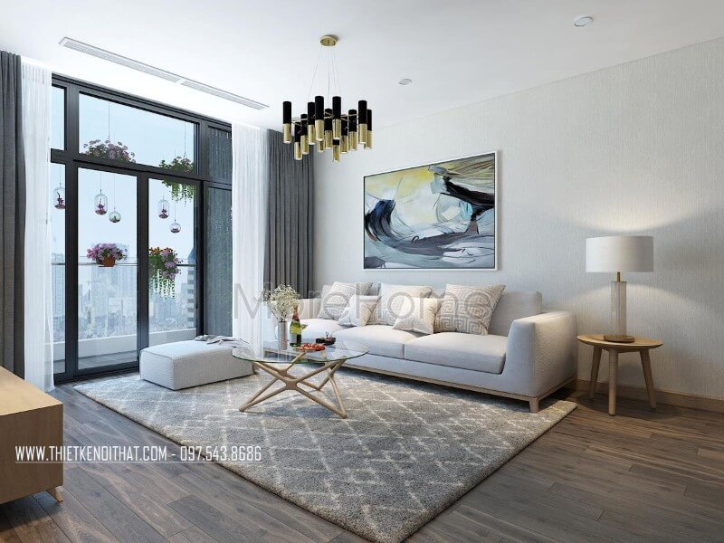 Mẫu sofa vải chân gỗ màu trắng là sự lựa chọn mà KTS và gia chủ thích mang đến điểm nhấn không thể rời mắt cho không gian. Thiết kế phòng khách chung cư hiện đại