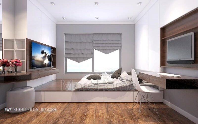 Kệ ti vi treo tường hiện đại âm tường sử dụng màu trắng với các khoảng không gian ở giữa để tận dụng làm giá để sách hay để ti vi giúp tiết kiệm diện tích và nới rộng không gian phòng